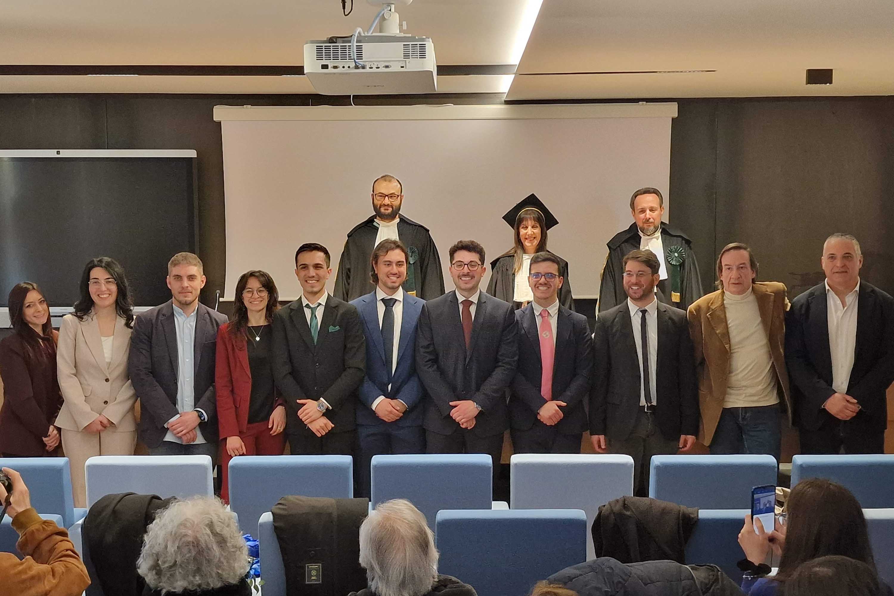 Gli undici professionisti insieme con la commissione giudicatrice