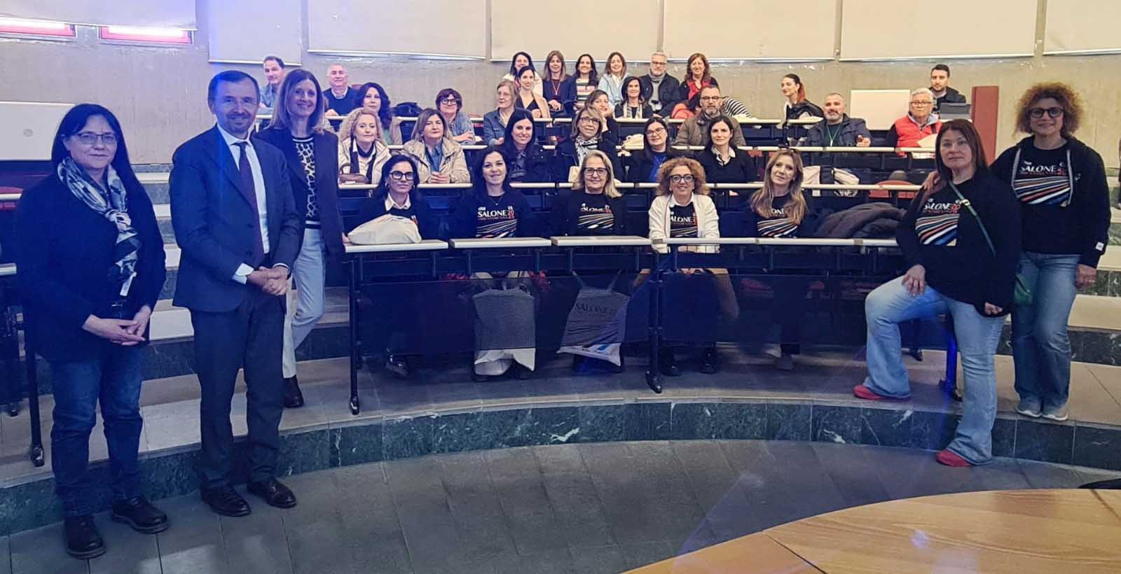 Roberto Ricci insieme con i docenti e lo staff del progetto OUI