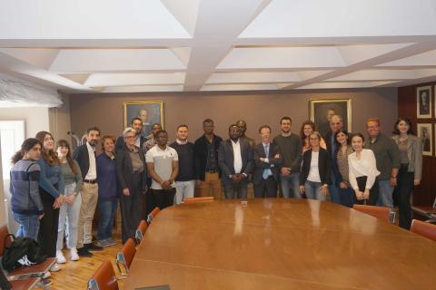 Gli studenti Josué, Mohamadou, Didier e Xavier insieme con il rettore Francesco Priolo e i referenti dei diversi partner