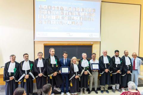 I premiati insieme con la commissione di laurea